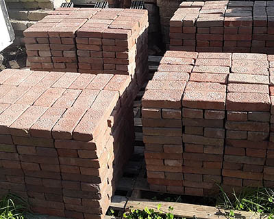 Reclaimed pallets of Coffeyville Sunflower bricks