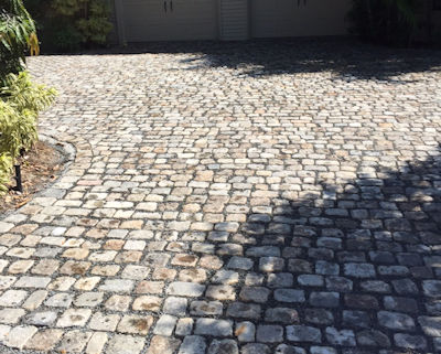 Random pattern gives an old world feel to this permeable stone driveway