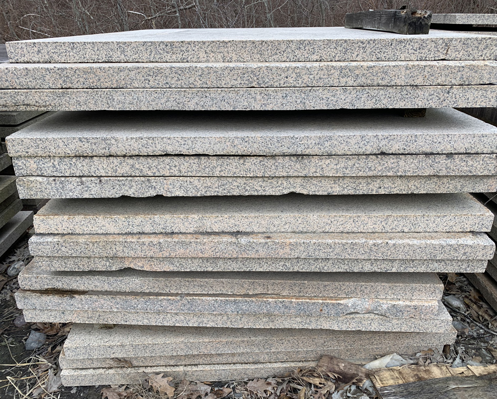 Our salvaged Heritage Plaza Pavers are stacked and ready for new life in your project.