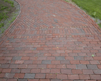 The mixture of brick types and brick installation patterns creates interesting pavement