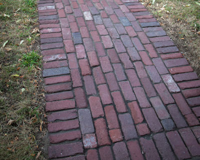 Reclaimed brick pathway with soldier course edging