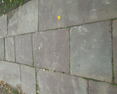 Salvaged stone walkway on a historic site is authentic period material
